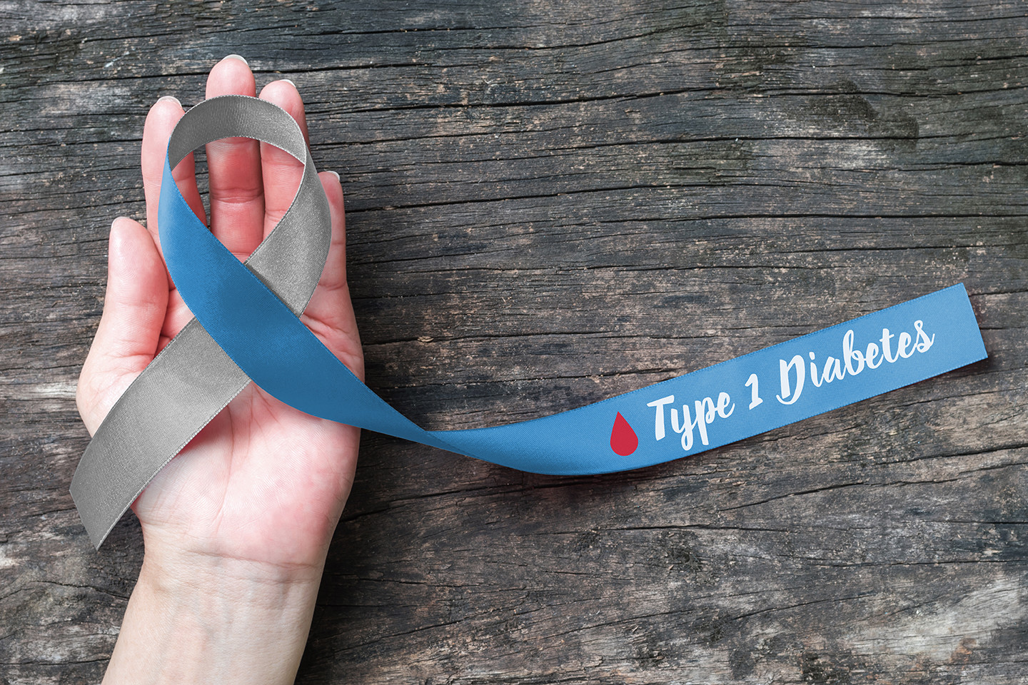 Blue ribbon with type 1 diabetes